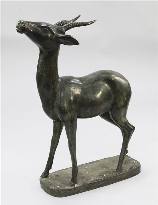 A 20th century large green patinated bronze figure of a gazelle, 31 x 36in.